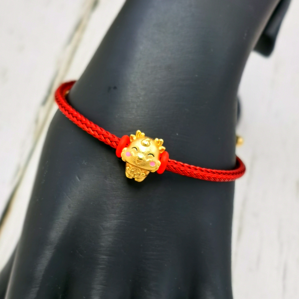 Adjustable band bracelet with charm