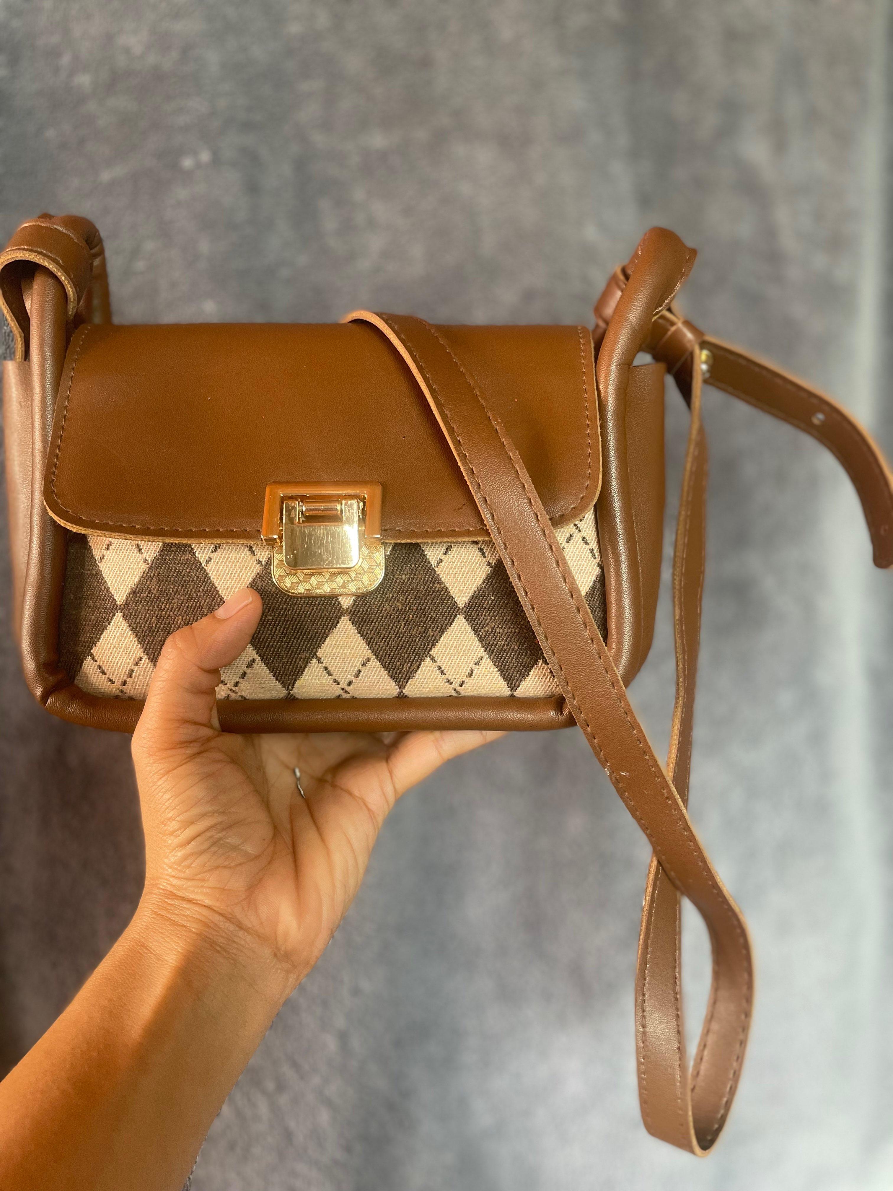 brown sling bag
